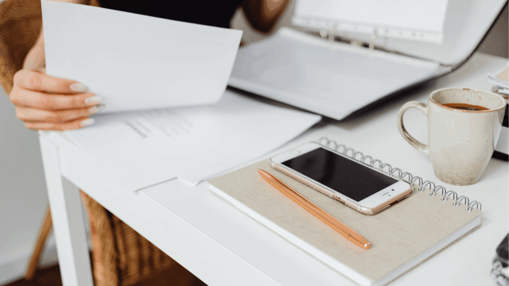 Organized desk setup symbolizing workflows systems and SOPs for creative businesses