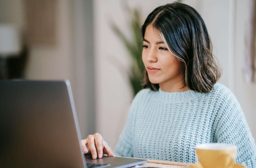 woman OBM for wedding pros on computer