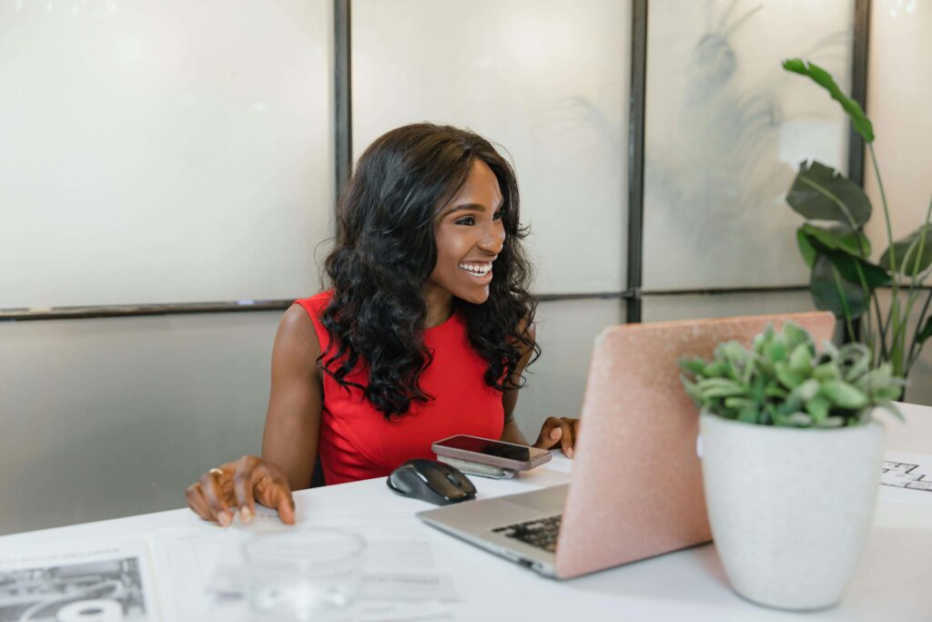 woman CEO wedding planner at computer