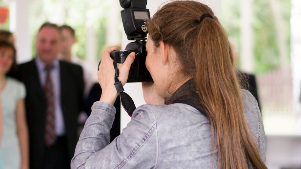 wedding photographer capturing the reception