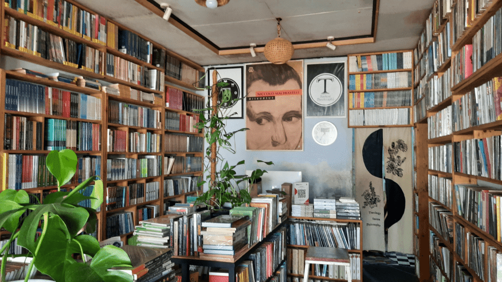 Interior of an independent bookstore with bookshelves and displays, representing quarterly marketing planning for creative business owners.