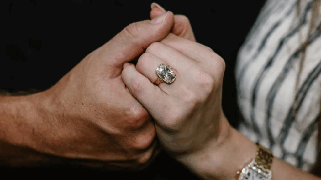 Taylor Swift's engagement ring style is influencing wedding industry trends. It features a vintage-inspired, old mine brilliant-cut diamond bezel-set in a gold band with filigree details, a style known for its romantic, antique aesthetic and one-of-a-kind nature. 