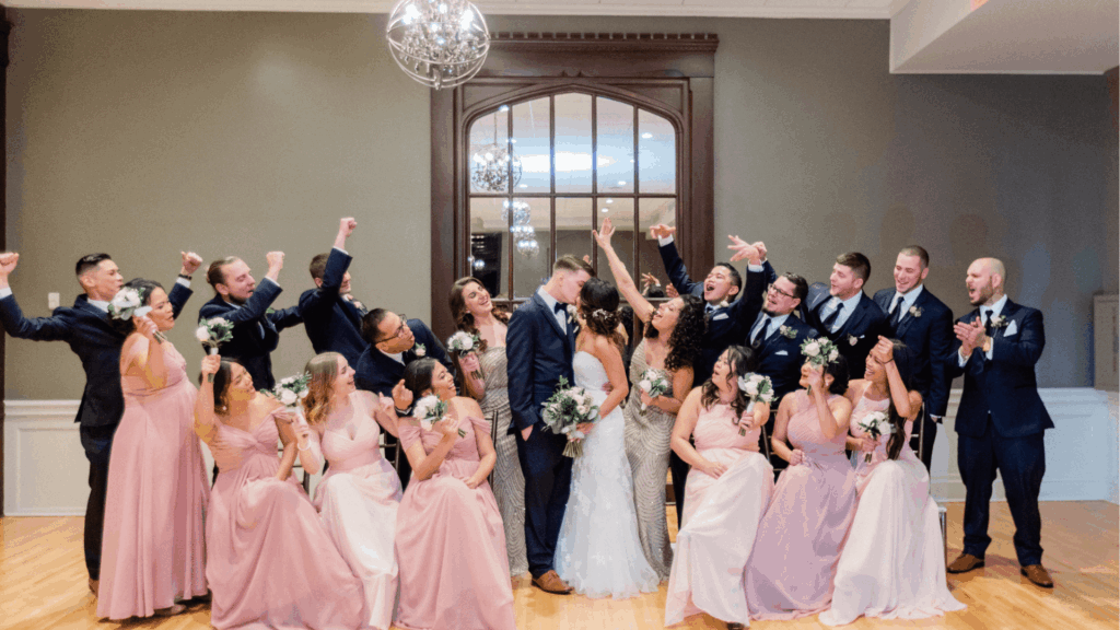 Gen Z wedding party celebrating with large group of friends and family