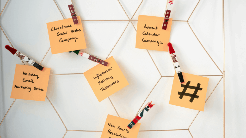 Sticky notes on campaign planning board showing social media, email, and holiday strategies for a marketing audit for wedding professionals.