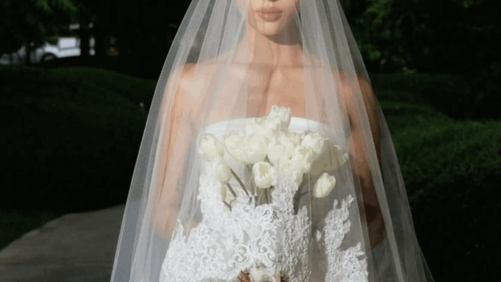 Bridal look inspired by the old money wedding aesthetic, featuring classic lace, a timeless veil, and understated luxury.