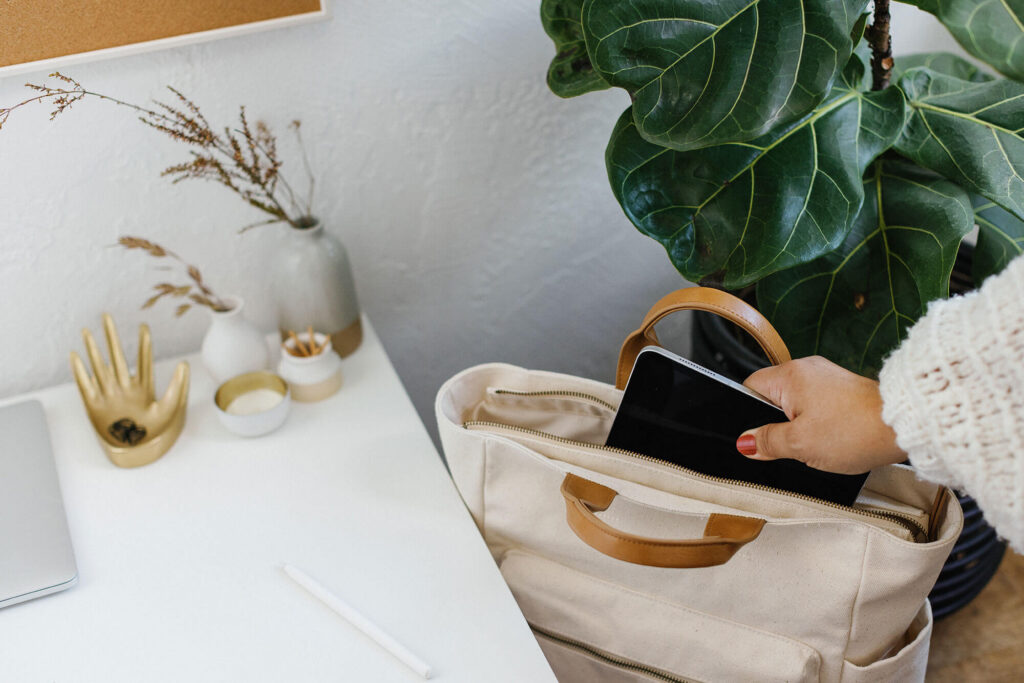 Organized marketing workspace with laptop and planner representing consistent marketing and AI search visibility planning.